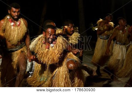 Fijian Men Dancing A Traditional Male Dance Meke Wesi In Fiji