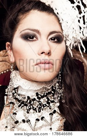 Glamour portrait of a girl in jewelry