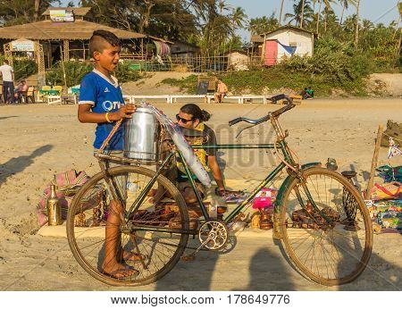 Arambol Beach, Goa, India - February 23, 2017: Boy With Bicycle At Flea Market On Arambol Beach At S