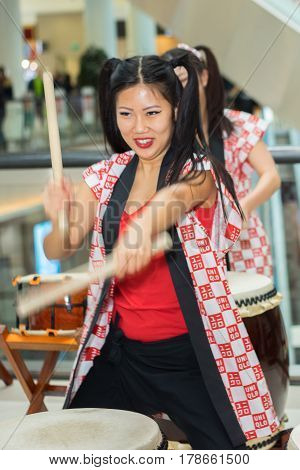 Moscow, Russia - March 25, 2017: Group Of Japanese Taiko Drummers Girls Perform In Kaleidoscope Shop