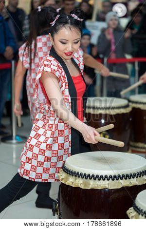 Moscow, Russia - March 25, 2017: Group Of Japanese Taiko Drummers Girls Perform In Kaleidoscope Shop