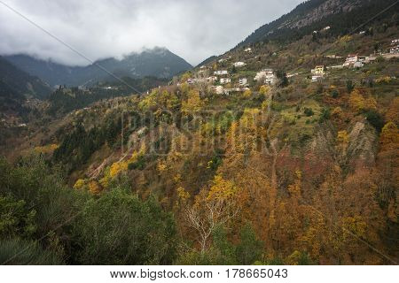 Scenic Mountain Autumn Landscape And Village Prusos