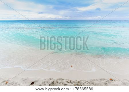 Beautiful beach and crystal clear turquoise sea in tropical Maldives island