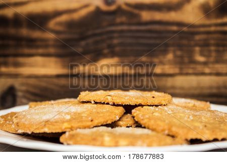 homemade sugar cookie on a plate wooden background