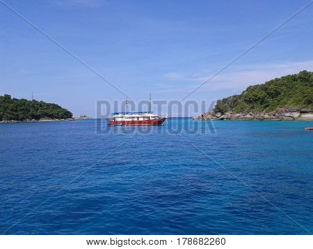 ship in the sea between Island thailand