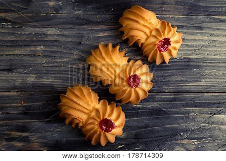 Cookies kurabe on a wooden table in a rustic style.