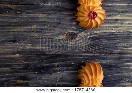 Cookies kurabe on a wooden table in a rustic style.