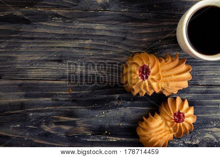 Cookies kurabe on a wooden table in a rustic style.