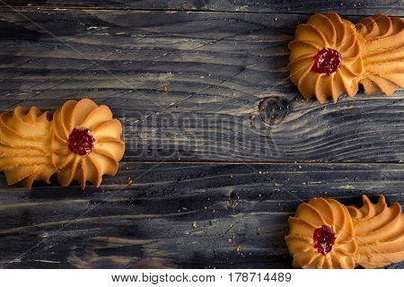 Cookies kurabe on a wooden table in a rustic style.