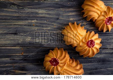 Cookies kurabe on a wooden table in a rustic style.