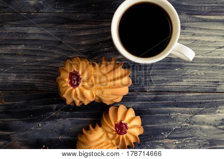 Cookies kurabe on a wooden table in a rustic style.