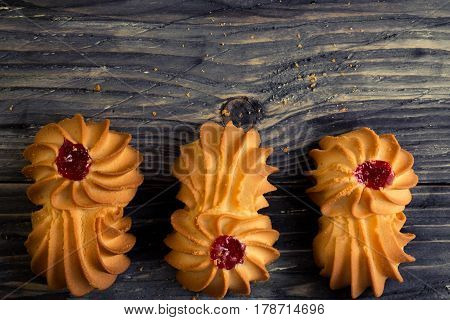 Cookies kurabe on a wooden table in a rustic style.