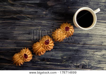Cookies kurabe on a wooden table in a rustic style.