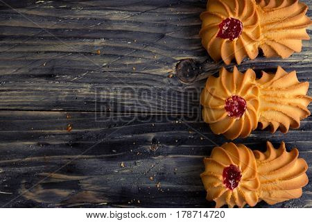 Cookies kurabe on a wooden table in a rustic style.