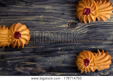 Cookies kurabe on a wooden table in a rustic style.
