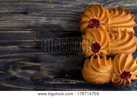 Cookies kurabe on a wooden table in a rustic style.