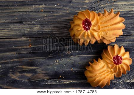 Cookies kurabe on a wooden table in a rustic style.