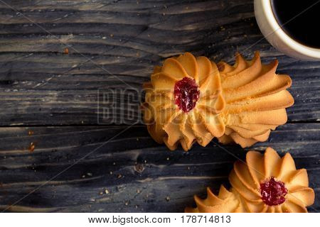 Cookies kurabe on a wooden table in a rustic style.