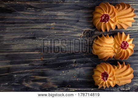 Cookies kurabe on a wooden table in a rustic style.