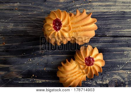 Cookies kurabe on a wooden table in a rustic style.