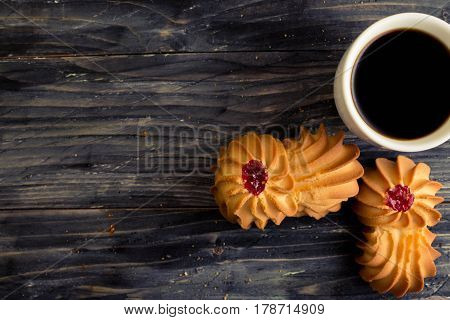 Cookies kurabe on a wooden table in a rustic style.