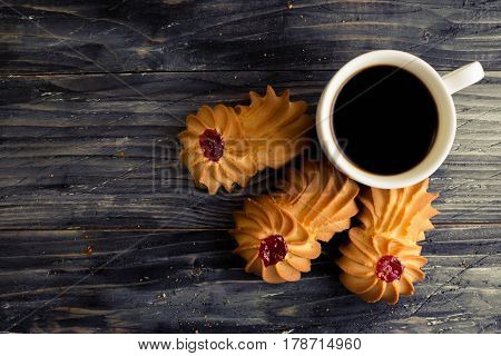 Cookies kurabe on a wooden table in a rustic style.