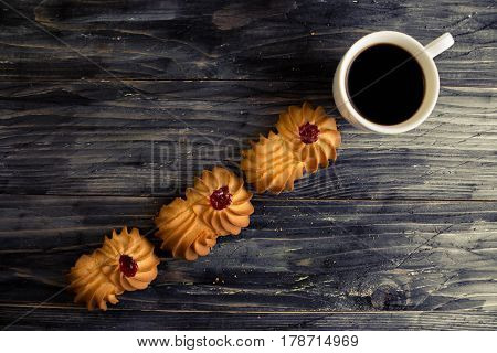 Cookies kurabe on a wooden table in a rustic style.