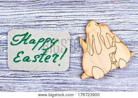 Couple of plywood bunnies. Easter greeting card. Ideas for Easter wishes.
