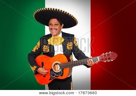 Charro Mariachi suonando la chitarra in sottofondo di bandiera del Messico