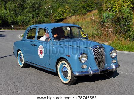 Mignanego Italy - September 25th 2015 - Reenactment 18th Pontedecimo Giovi: The Lancia Appia n. 39, 1958 conducted by Ermanno Meletti during a timed regularity 'test.