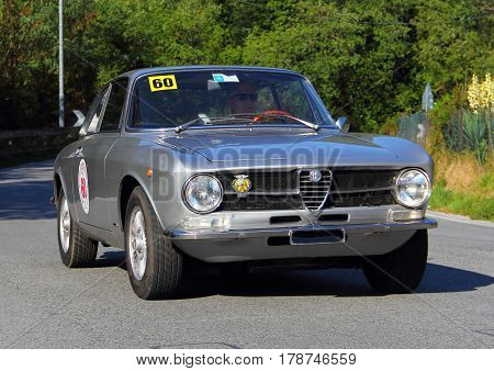 Mignanego Italy - September 25th 2015 - Reenactment 18th Pontedecimo Giovi: The Alfa Romeo GT 1967 conducted by Marco Capotosti during a timed regularity 'test.