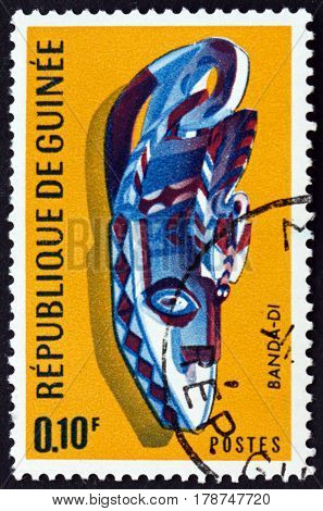 GUINEA - CIRCA 1967: a stamp printed in Guinea shows Small Banda Mask Kanfarade Boke Region circa 1967
