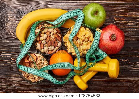 Fruits, nuts and dumbbells. Philosophy of a successful life.