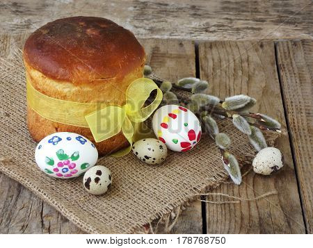 Easter Composition Of Sweet Bread, Paska And Eggs On Wooden Background. Orthodox Kulich. Holidays Br