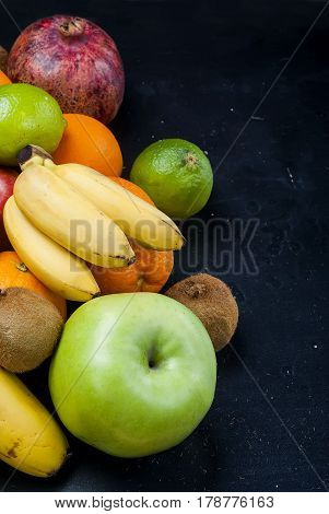 Many Various Fruits On A Black Background