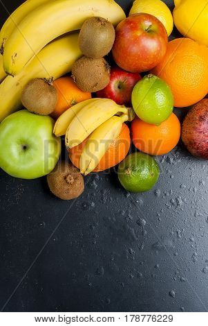 Many Various Fruits On A Black Background
