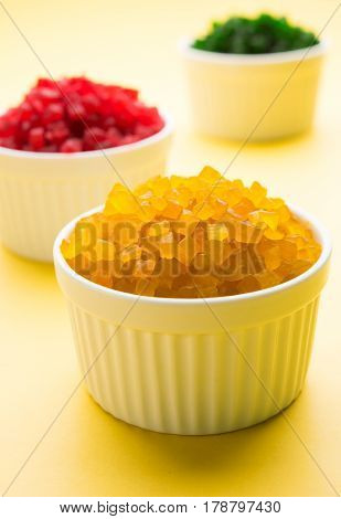 Sweet Fruit Candy Also Know As tutti-frutti, Candied Fruits served in a bowl used in masala pan in india or in cakes or sweets