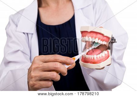 Series Of Dentist Showing Correct Method Of Brushing Teeth