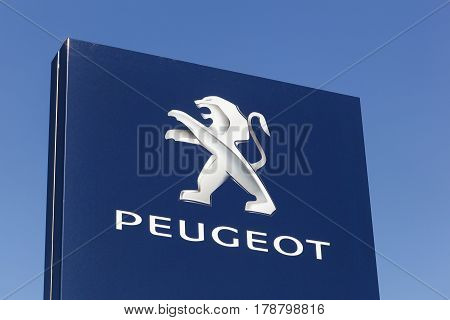 Holme, Denmark - March 26, 2017: Peugeot logo on a panel. Peugeot is a French cars brand, part of PSA Peugeot Citroen group  and Peugeot company was founded in 1810