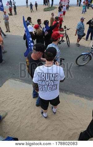 Huntington Beach, CA - March 25 2017: Make America Great Again March. Thousand of Supporters of republican president Donald Trump, march and wave flags, at a MAGA March in Huntington Beach. 




