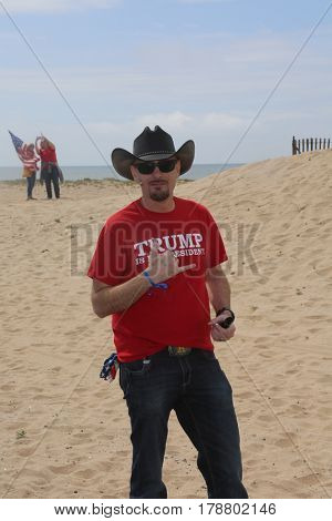 Huntington Beach, CA - March 25 2017: Make America Great Again March. Thousand of Supporters of republican president Donald Trump, march and wave flags, at a MAGA March in Huntington Beach. 




