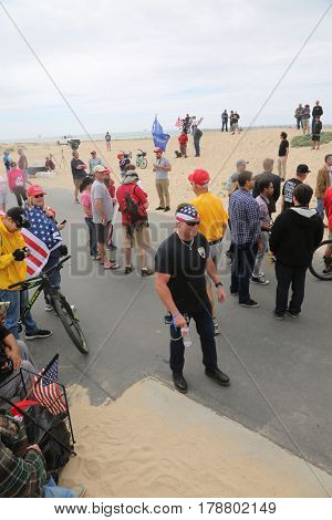 Huntington Beach, CA - March 25 2017: Make America Great Again March. Thousand of Supporters of republican president Donald Trump, march and wave flags, at a MAGA March in Huntington Beach. 




