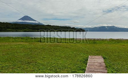 Ilyinsky stratovolcano located in the southern part of Kamchatka Peninsula near Kurile Lake.