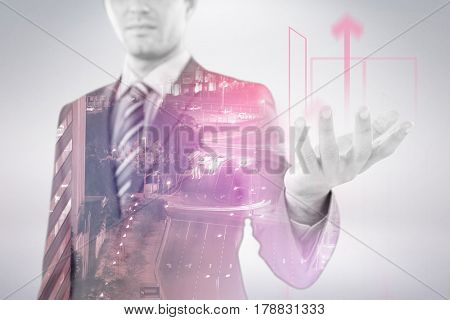 Businessman gesturing against white background against illuminated road amidst building at night 3d