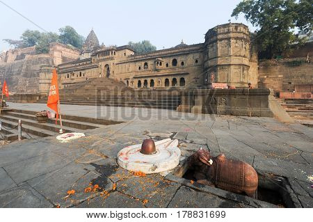 People Walking In Front Of Maheshwar Palace On India