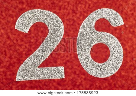 Number twenty-six silver color over a red background. Anniversary. Horizontal