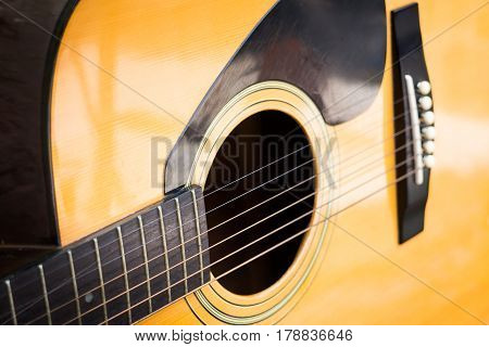 Wooden Yellow Classic Acoustic Guitar stock photo