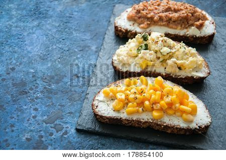 Mix Of Rye Bread Bruschettas With Various Filling. Sweet Corn Omlet Tuna Seeds Cheese Avocado Sandwi