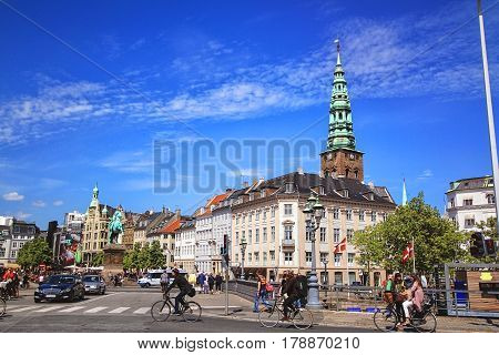 COPENHAGEN DENMARK - JUNE 15: Crossroad with Statue of Bishop Axel Absalon and St. Nicholas Church Hojbro Plads in 2012.