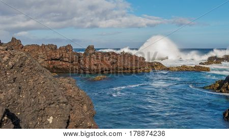 Wide angle view of volcanic coast in Biscoitos, Terceira, Portugal